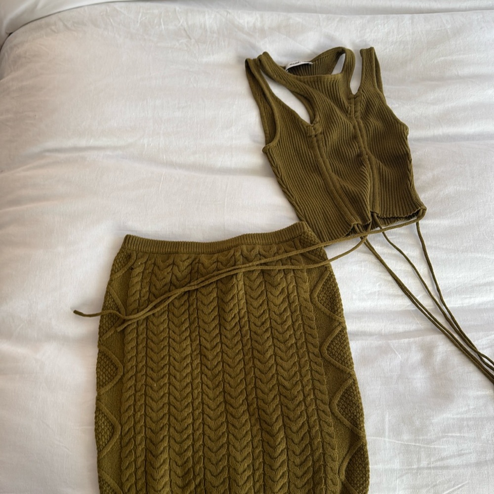 Danielle Guizio sets green sweater cutout asymmetrical